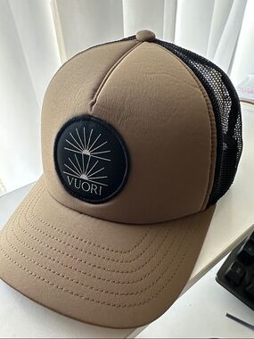 Vuori Beige Trucker Cap with Black Logo Patch